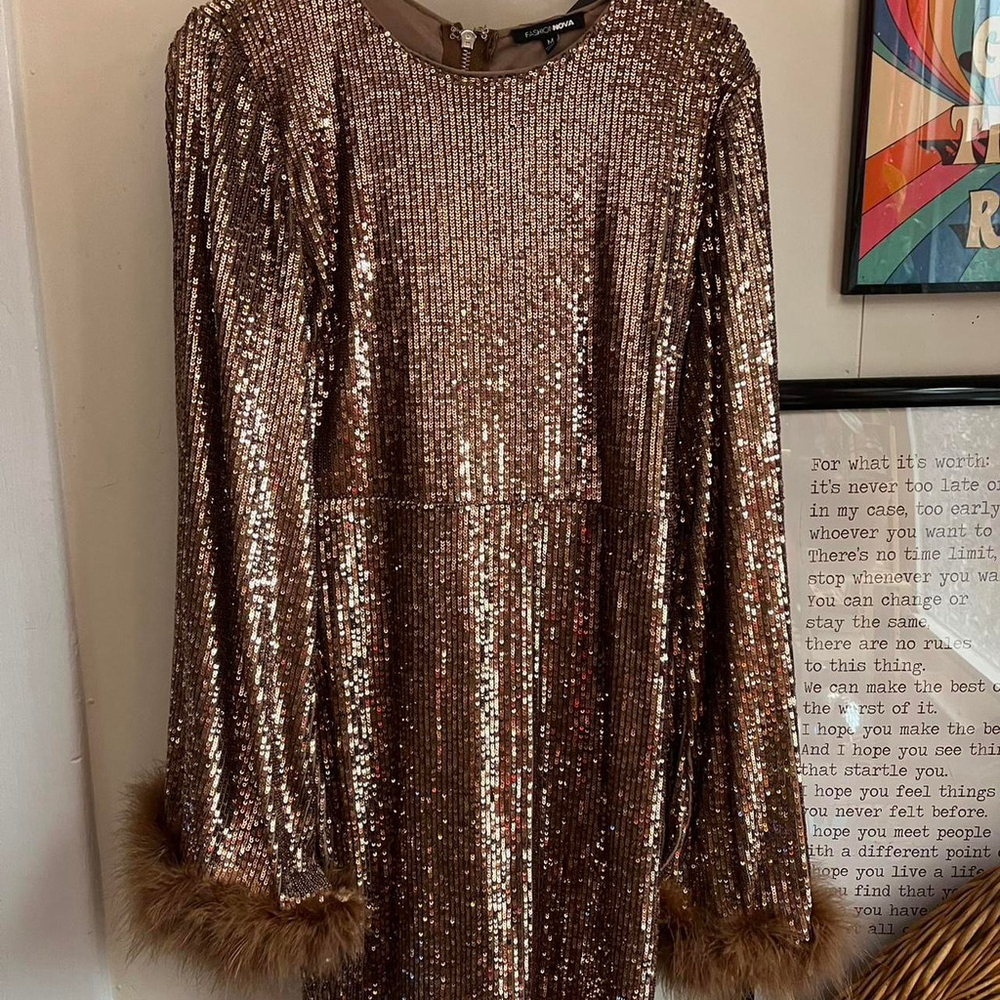 Gold sequin mini dress with flare fur trim #glammini #partydress